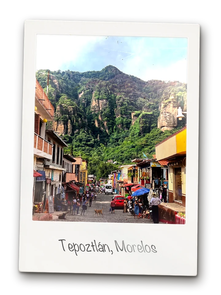 The main street through Tepoztlán running toward the Tepozteco cliffs